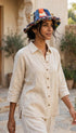 Hemp cotton patchwork hat fringed brim tilt side view 2