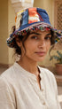 Hemp cotton patchwork hat fringed brim tilt side view