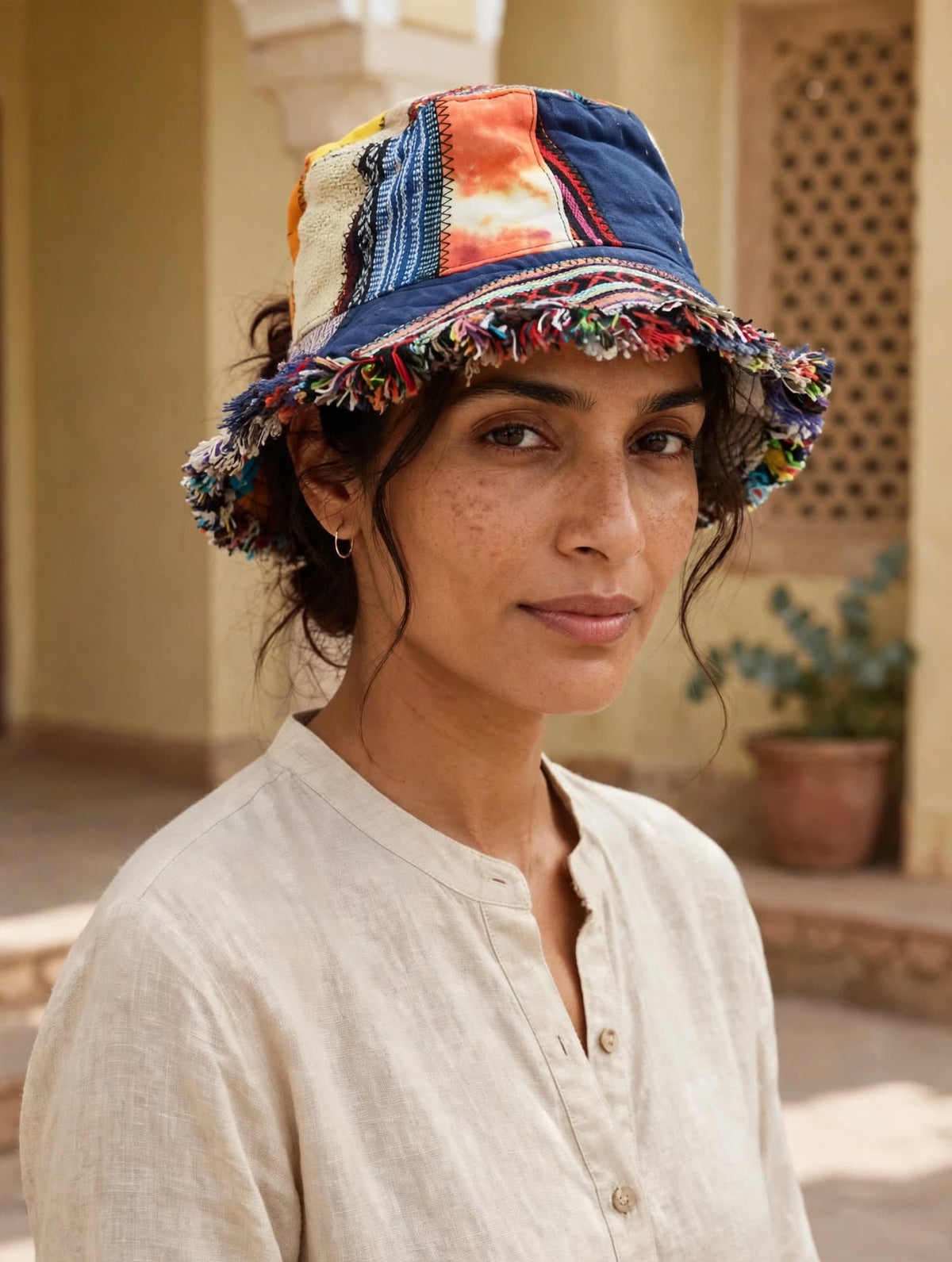 Hemp cotton patchwork hat fringed brim tilt side view
